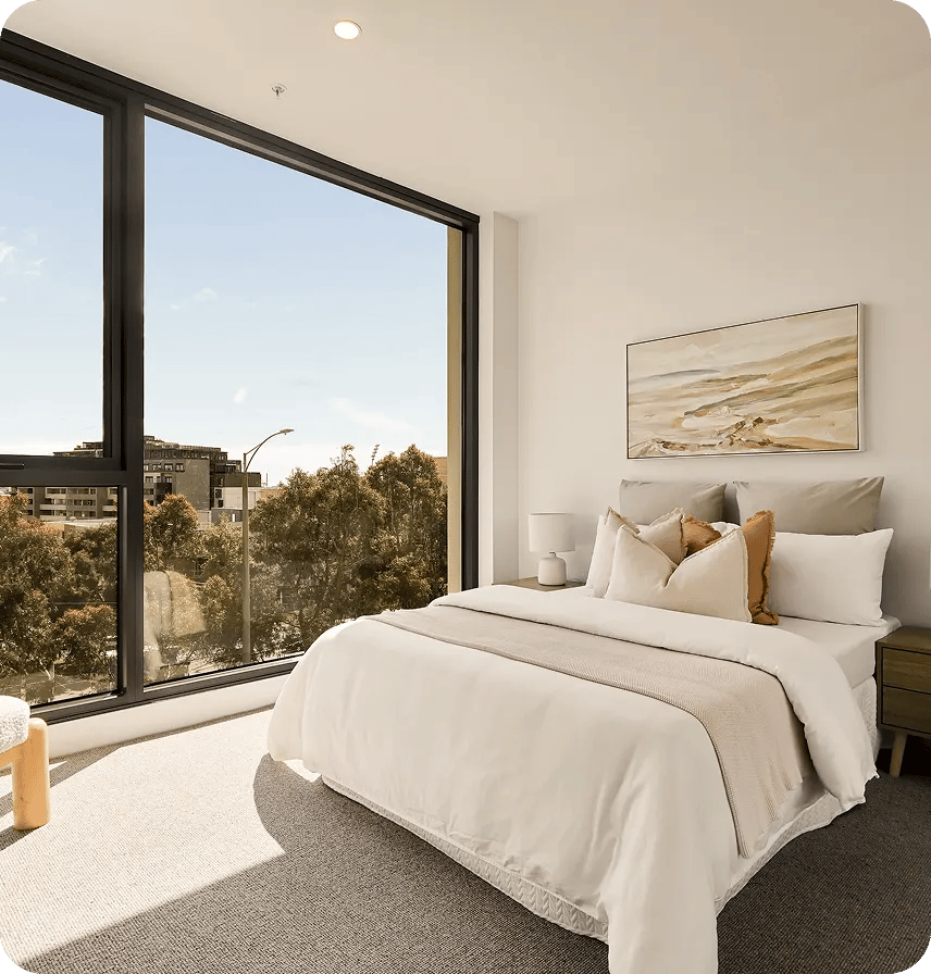 Bedroom with floor-to-ceiling windows at 52 St Kilda